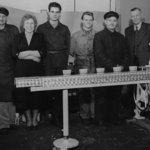 1958: Cup filling and closing machine